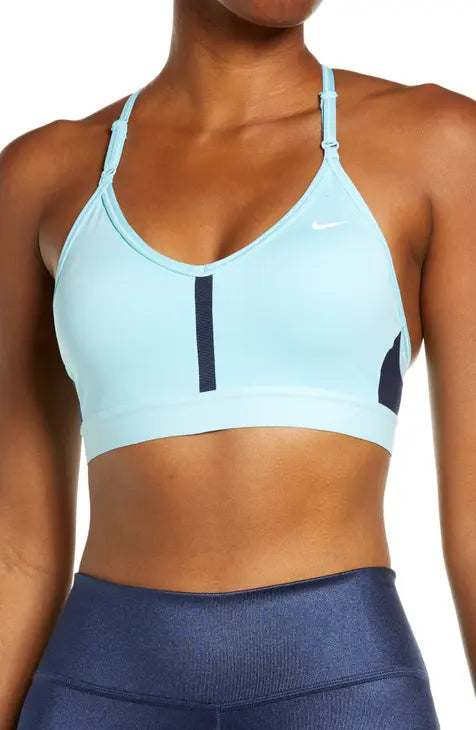 Nike Indy Light-Support Padded V-Neck Sports Bra The Nike Dri-FIT Indy Sports  Bra makes simple support even easier with straps that adjust in the front.  Soft fabric is designed for breathability on