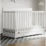 New in Box! Graco Asheville 4-in-1 Convertible Crib with Storage, Manufacture Date 07/22, Retails $449+ NOTE: Couple minor scuffs from packaging mostly on back board