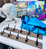 Home/Art Lot 6 Piece, Sculpted heavy head statue, 2 pc artwork, laundry bag, 5 Hook wall boards x2
