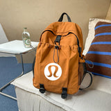 New DUPE LU LU Inspired Backpack with large logo! Great quality! Tons of room to hold all of your essentials! Carhartt Brown colour