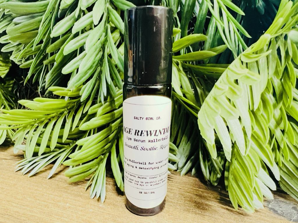 New Salty Girl Co. Age Rewinder Rollerball Serum, 10 ml! Roll your way to youthful under eyes! Roll into temples to help with headaches or roll anywhere else you desire!