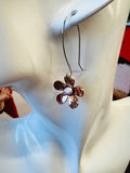 New dangle metal flora earrings in rose gold tone