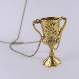 New Harry Potter Horcrux Hufflepuff Cup Necklace in Gold Finish, designed like a miniature version of Helga Hufflepuff's cup