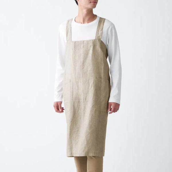 New with tags! MUJI Linen Shoulder Strap Apron with two front pockets. Includes a small pouch for easy storage. Sz Large! Retails $50+