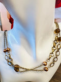 New Nygard Collection Bronze tone long necklace with lobster clap closure! 20 Inch