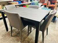 Item has light use! Wayfair Dark Grey Dining Table & 4 Ultra soft faux leather Chairs Grey by Safavieh! Great Quality!