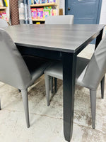 Item has light use! Wayfair Dark Grey Dining Table & 4 Ultra soft faux leather Chairs Grey by Safavieh! Great Quality!