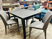 Item has light use! Wayfair Dark Grey Dining Table & 4 Ultra soft faux leather Chairs Grey by Safavieh! Great Quality!