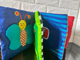 Baby's Book - Interaction on every page! Fabric, lift the flaps inside to reveal surprises. Rattles, toys different textures