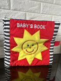 Baby's Book - Interaction on every page! Fabric, lift the flaps inside to reveal surprises. Rattles, toys different textures