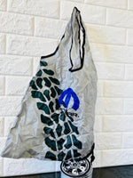 Set of 2 Packable reusable shopping bags, Mopar Branded! packs compactly into a Mopar tire designed bag! Great to take shopping or use for lunch bag. Made of non rip nylon. Washable/reusable!