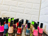 Revlon 32 Piece Nail Polish Lot, bottles are in mixed condition from shipping, great variety