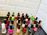 Revlon 32 Piece Nail Polish Lot, bottles are in mixed condition from shipping, great variety