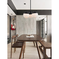 Three Light Pendant in Black And Frosted White by Elegant Lighting from the Eclipse collection. Retails $432+