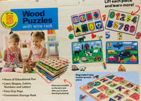 Set of 5 Wood pUzzles with wire rack! Pegs make it easy to pick up the puzzle pieces