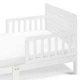 New in box! New Zealand Pine DaVinci Modena Toddler Bed in White! Mattress NOT Included! Note: 1 Footboard leg has paint chips could touch up with paint!