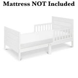 New in box! New Zealand Pine DaVinci Modena Toddler Bed in White! Mattress NOT Included! Note: 1 Footboard leg has paint chips could touch up with paint!