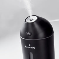 New in box! Hey Dewy Portable Facial Humidifier, Black! Get the cutest, facial humidifier today - your skin and hair will thank you for it.