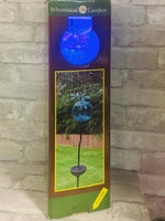 whimsical garden dragonfly solar light stake! Glass orb glows blue automatically at night!