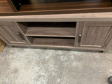 New ASSEMBLED HOMETRENDS FARMHOUSE TV STAND-RUSTIC FINISH! Note: Our handles are different & small damage on bottom on 1 leg, shown in pics!