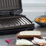 New in box! George Foreman 4 Serving Electric Grill and Panini Press in Red