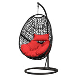 Shows very light use! Henryka Ltd Hanging Egg swing with red cushions, Black Frame! 350 Lb weight capacity! Retails $490+