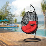 Shows very light use! Henryka Ltd Hanging Egg swing with red cushions, Black Frame! 350 Lb weight capacity! Retails $490+