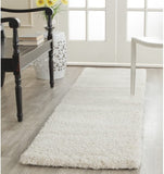 Milan Shag Ivory 2 ft. x 8 ft. Runner Rug! Made in Turkey! Ultra-Plush fabric encourages your bare-feet to indulge in luxury Retails $249 W/Tax!