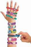 Fashion Angels Not Just Knotz Bungee Braids Kit! Use the loom with movable pegs to make 7 different styles of knotted bracelets! Makes 12 in total!