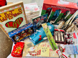 Lot 169- Large Lot Christmas New, 4 Christmas ugly sweaters, Artwork, Banners, outside 7 foot banners, 2 sets of Christmas Kitten cards, 17 Christmas CD sets, snowmen, solar stake, believe bells etc, 56 Pieces
