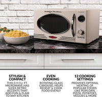 Nostalgia Retro 0.9 Cubic Foot Microwave; A Retro-styled microwave with all the conveniences of a modern kitchen appliance!