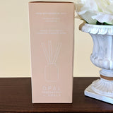 New in package! Liquid Free Diffuser Kit-Opal Passion Fruit & Amber! Made with Essential Oils!