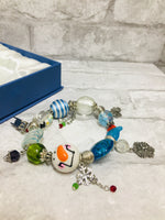 Brand new in Gift Box, Handmade Snow Day Glass bead bracelet! Adjustable! Great for Women, Teens & even children age 5+!