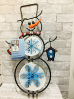 Brand new all weather resistant metal Snowman wind spinner! Welcome your guests with the spin and sparkle of the double snowflake spinners.